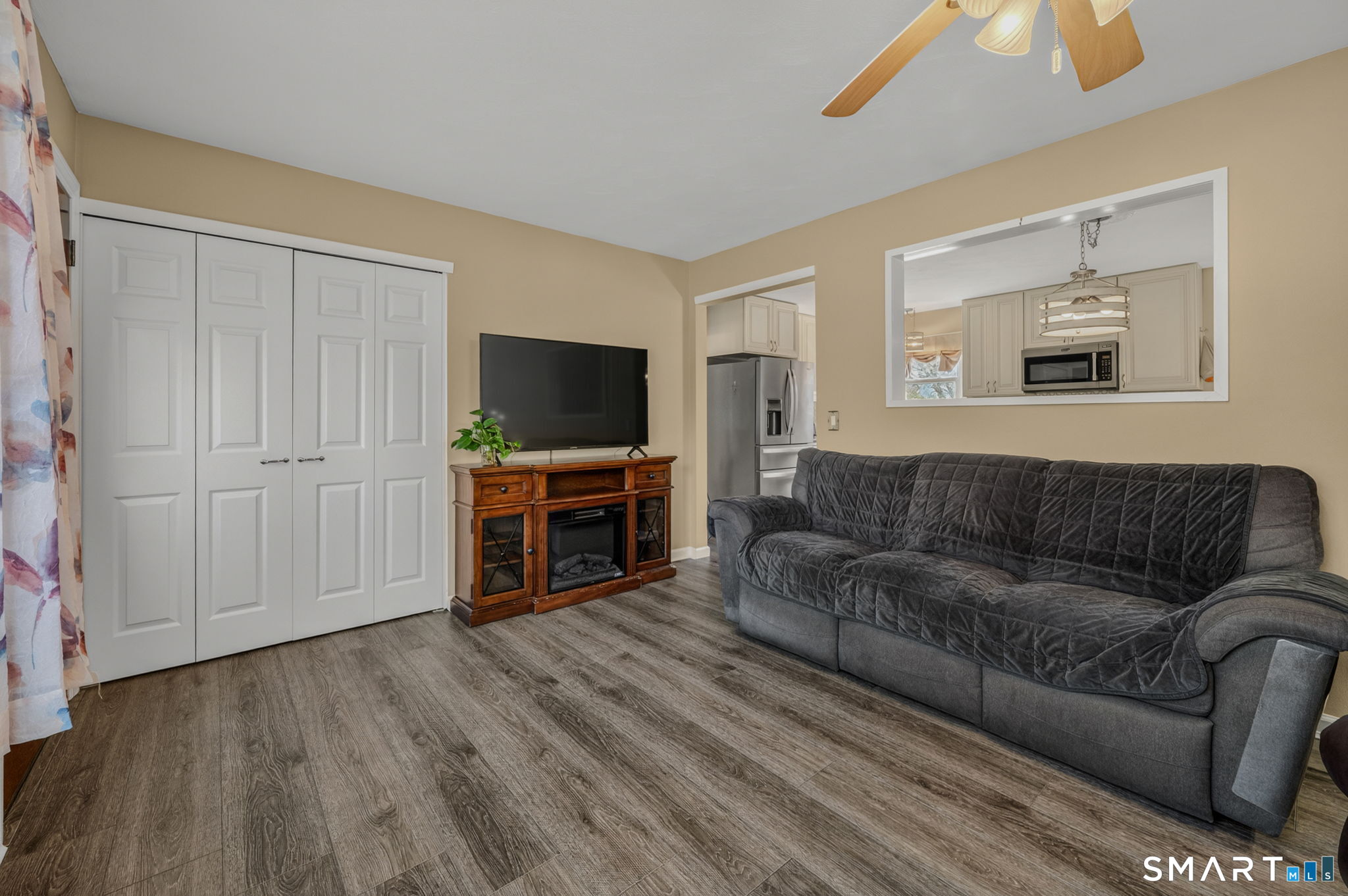 194 Browning Road Norwich, CT 06360 - Photo 9 of 38 a living room with furniture and a flat screen tv