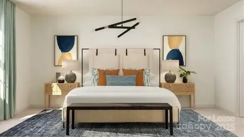a bedroom with a bed a mirror and lamp