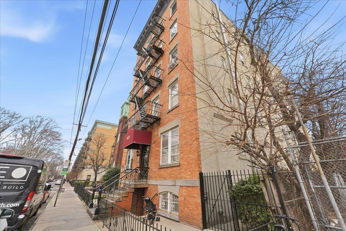831 Clinton Street, Unit 9 Hoboken, NJ 07030 - Photo 15 of 20 a view of a house with a yard
