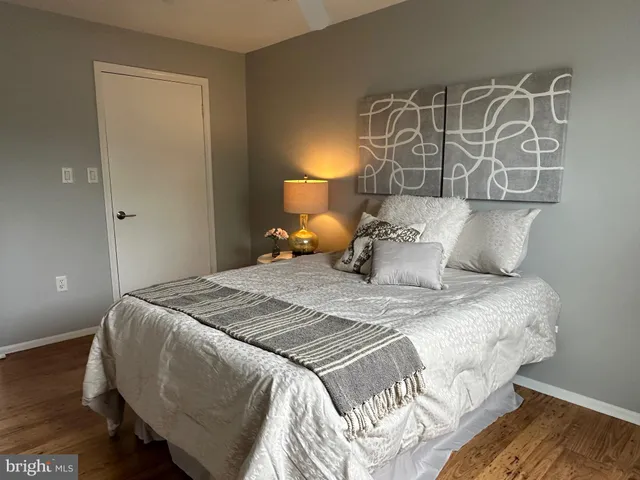 a view of room and wooden floor