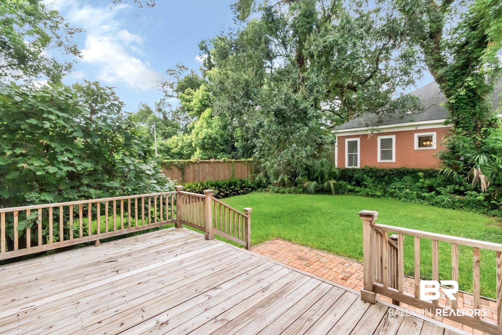 959 Dauphin Street Mobile, AL 36604 - Photo 40 of 43 Deck featuring a yard