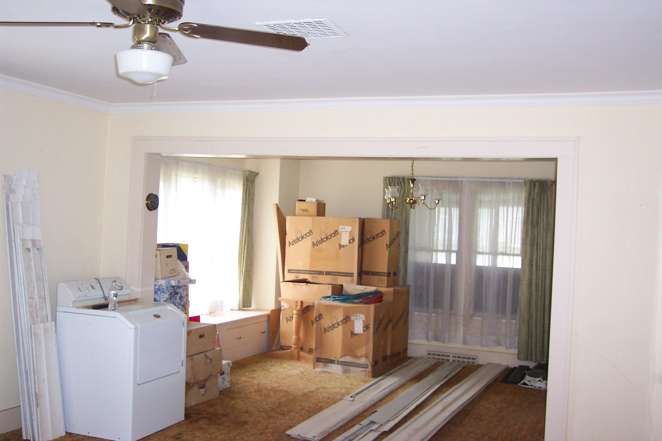 106 3rd Avenue Forreston, IL 61030 - Photo 3 of 18 a view of a kitchen with kitchen island granite countertop a refrigerator and a stove