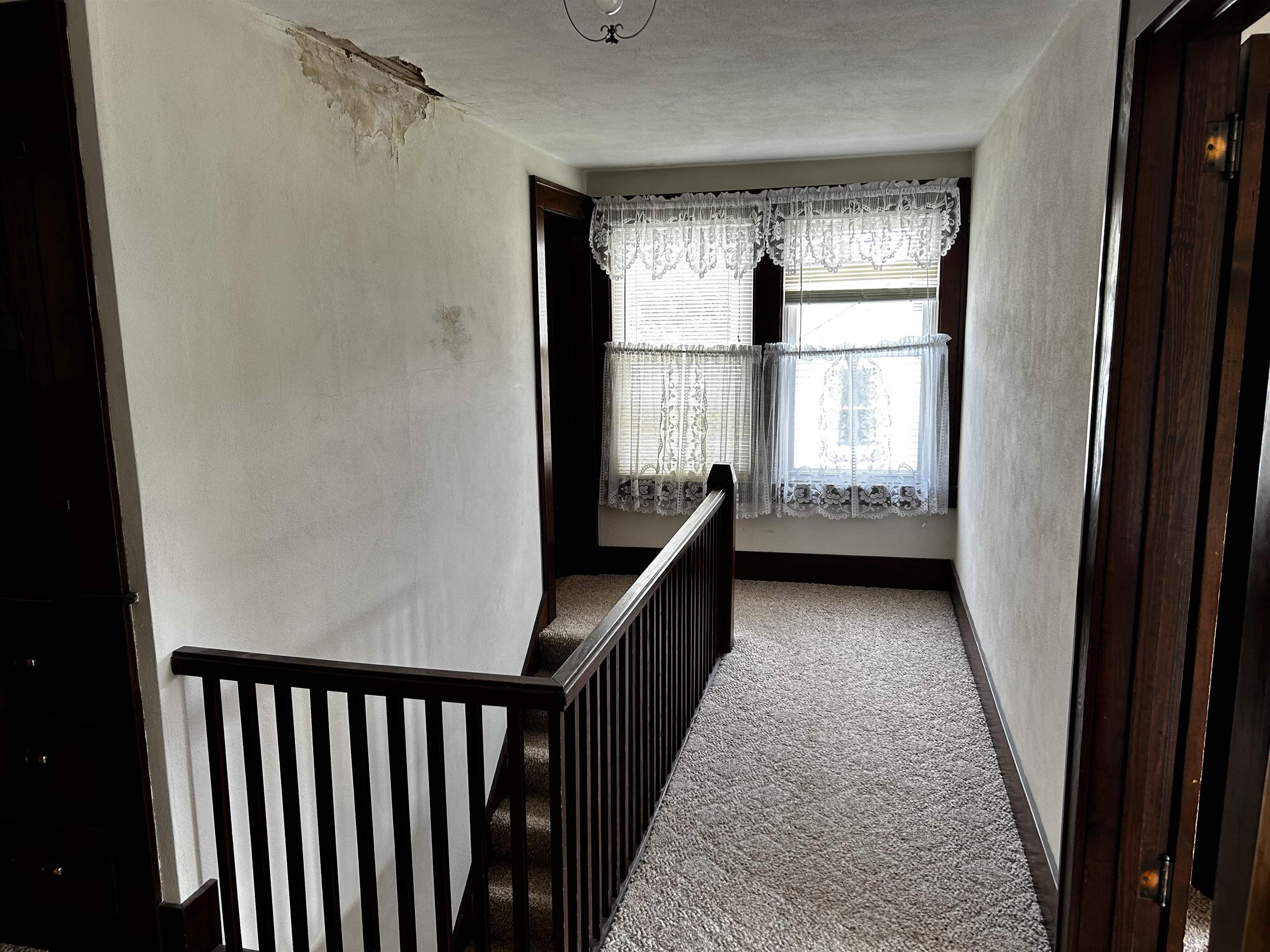 106 3rd Avenue Forreston, IL 61030 - Photo 6 of 18 a view of a hallway