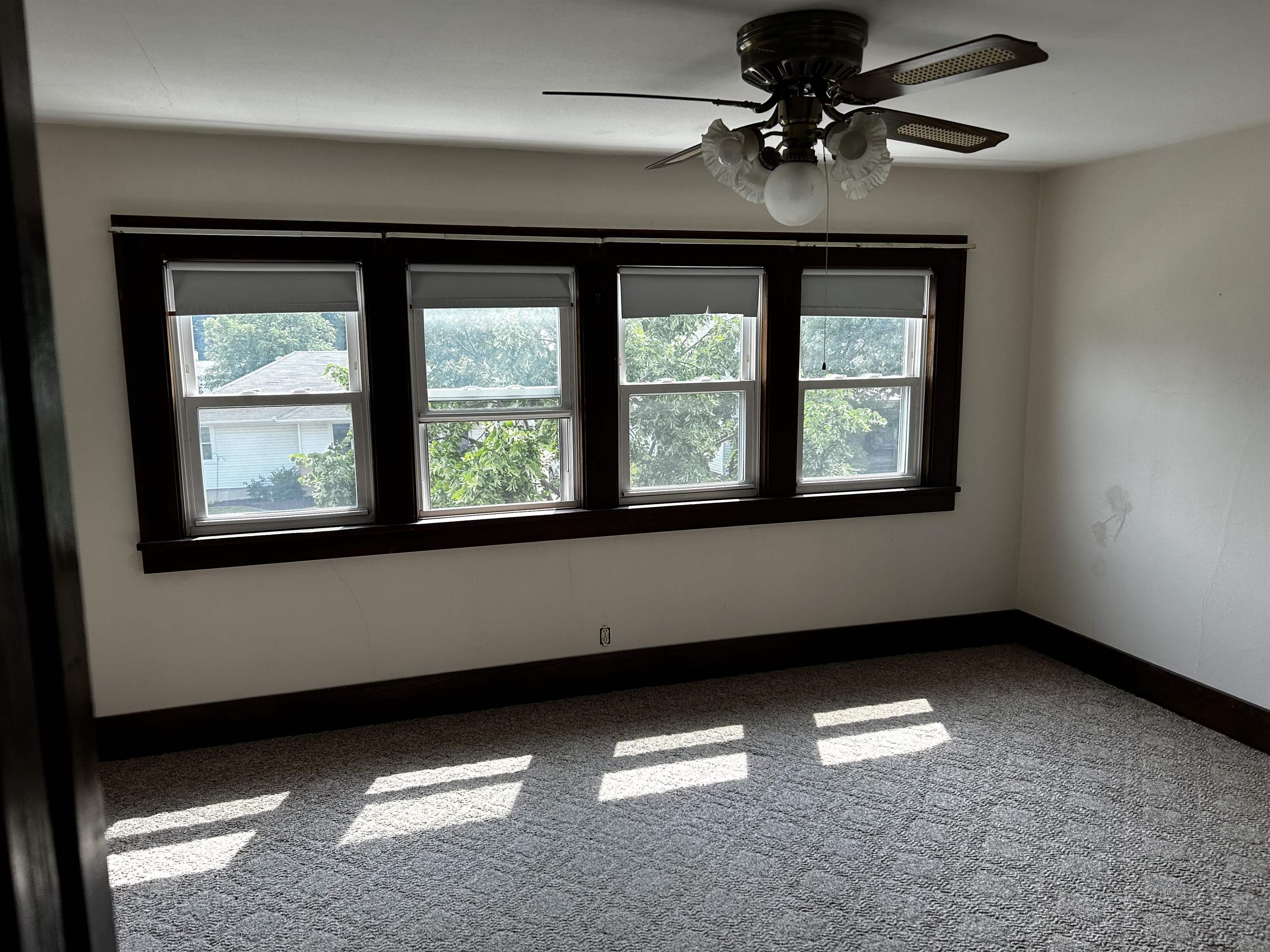 106 3rd Avenue Forreston, IL 61030 - Photo 10 of 18 a view of an empty room with a window