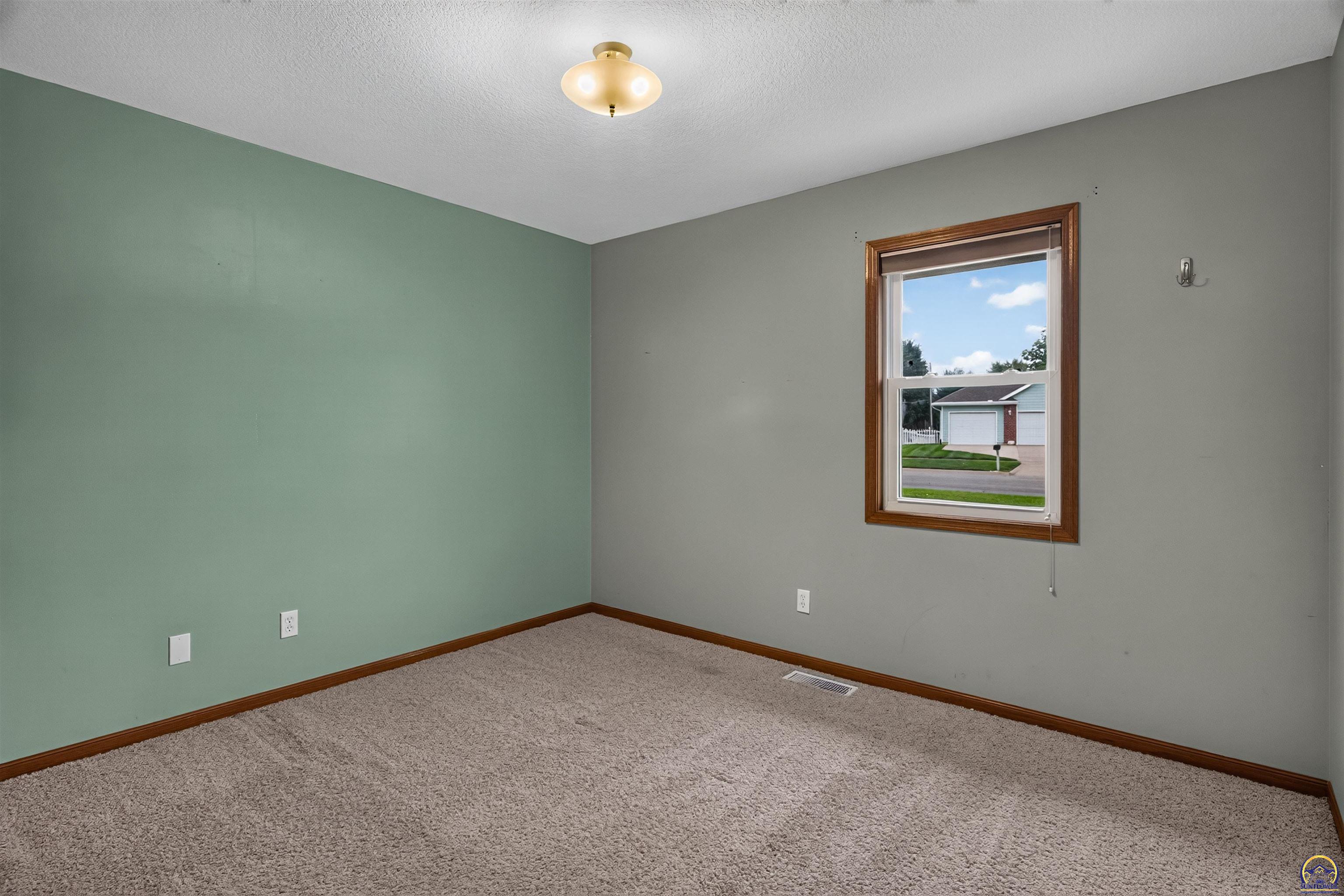 3909 Southwest 40th Street Topeka, KS 66610 - Photo 16 of 32