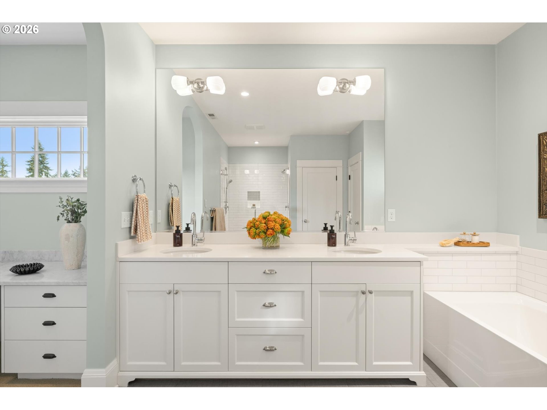 3431 Northeast Alameda Street Portland, OR 97212 - Photo 20 of 37 a bathroom with a sink a mirror and a bathtub
