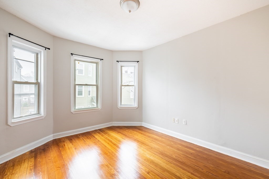 17 Cawfield Street, Unit 2 Boston, MA 02125 - Photo 9 of 14 an empty room with a window