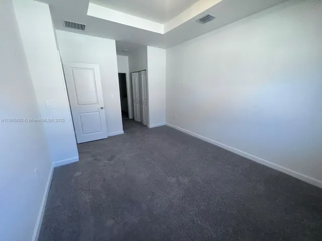 a view of hallway with closet