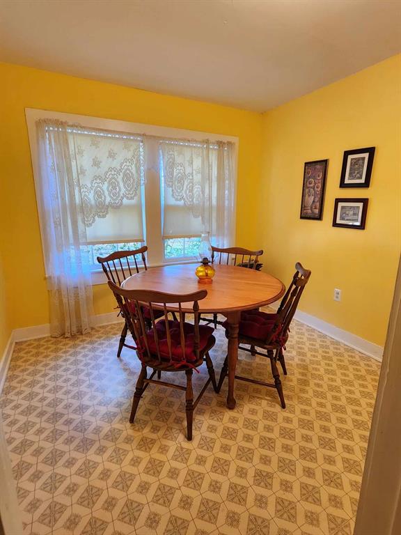 14816 Highway 84 Logansport, LA 71049 - Photo 14 of 21 a dining room with furniture and window