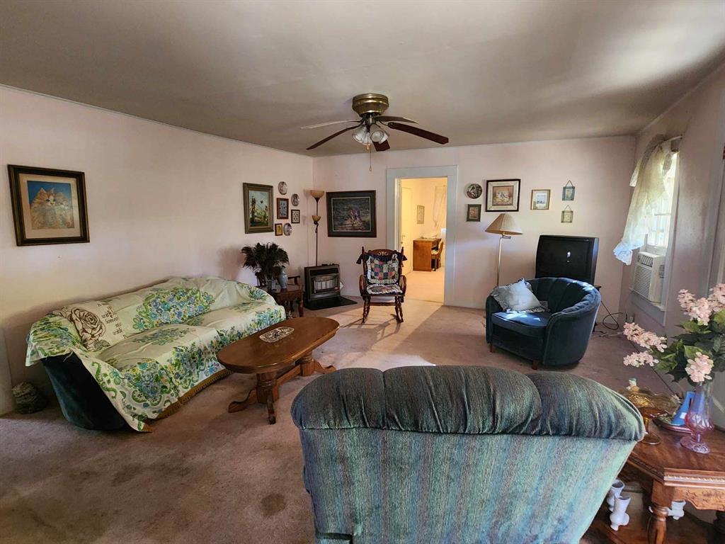 14816 Highway 84 Logansport, LA 71049 - Photo 20 of 21 a bedroom with a bed window and couch