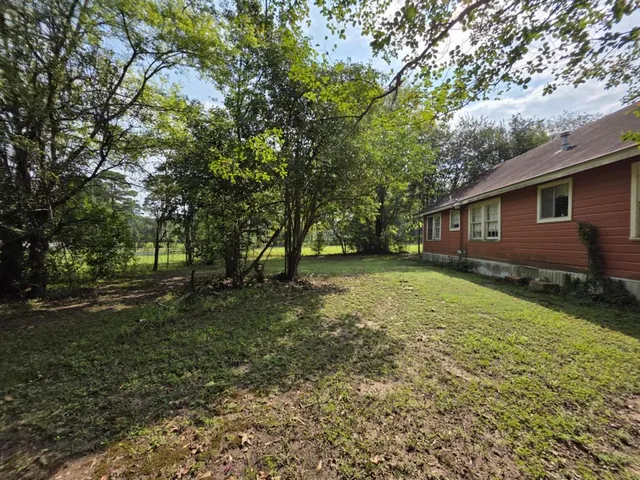 a view of outdoor space and yard