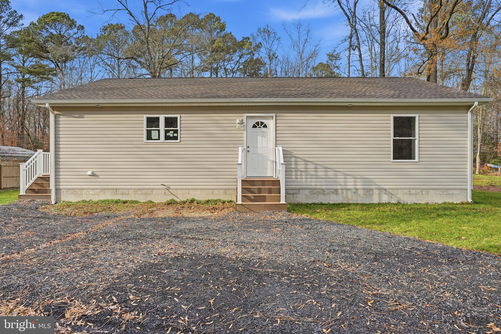 897 Horsepen Road Felton, DE 19943 - Photo 10 of 38 a view of a house with a backyard
