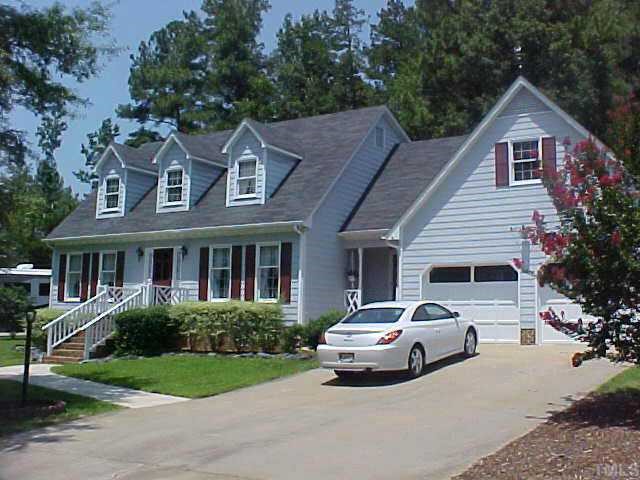 2012 Umstead Road Durham, NC 27712 - Photo 1 of 1 a car parked in front of white house