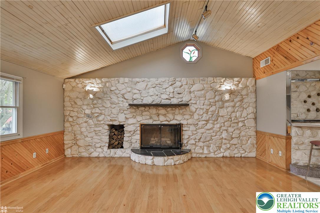 900 Mine Lane Road Easton, PA 18045 - Photo 11 of 51 a living room with furniture and a fireplace