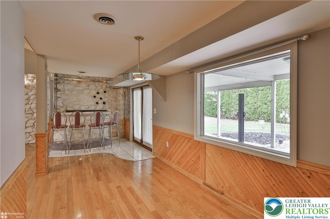 900 Mine Lane Road Easton, PA 18045 - Photo 17 of 51 a view of empty room with wooden floor and fan