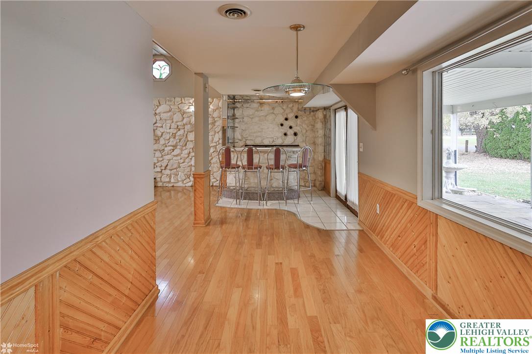 900 Mine Lane Road Easton, PA 18045 - Photo 18 of 51 a view of empty room with wooden floor and fan