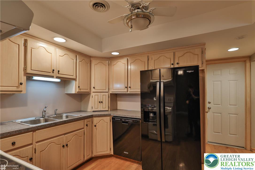 900 Mine Lane Road Easton, PA 18045 - Photo 21 of 51 a kitchen with stainless steel appliances granite countertop a refrigerator a sink and white cabinets