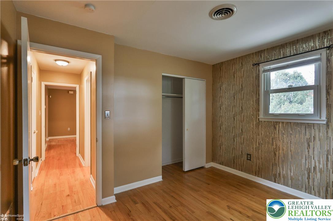 900 Mine Lane Road Easton, PA 18045 - Photo 30 of 51 wooden floor in an empty room with a window
