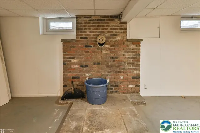 a view of a storage & utility room with sink