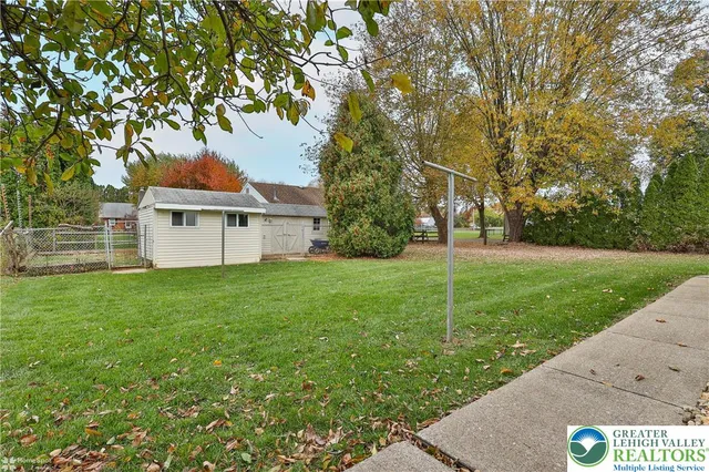 a view of a backyard with a garden