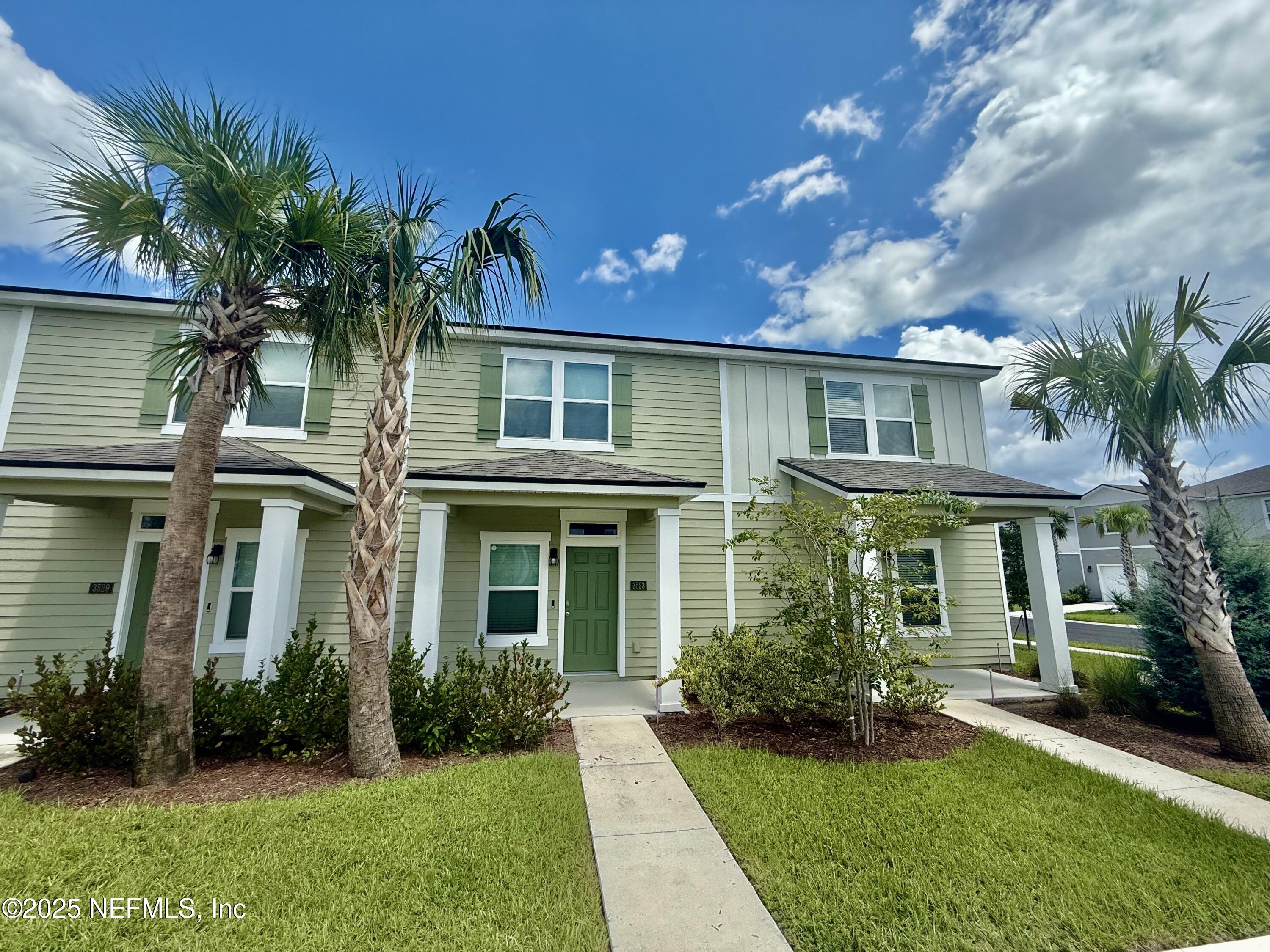 3523 Prairie Wind Court Middleburg, FL 32068 - Photo 12 of 13 front view of a house with a yard