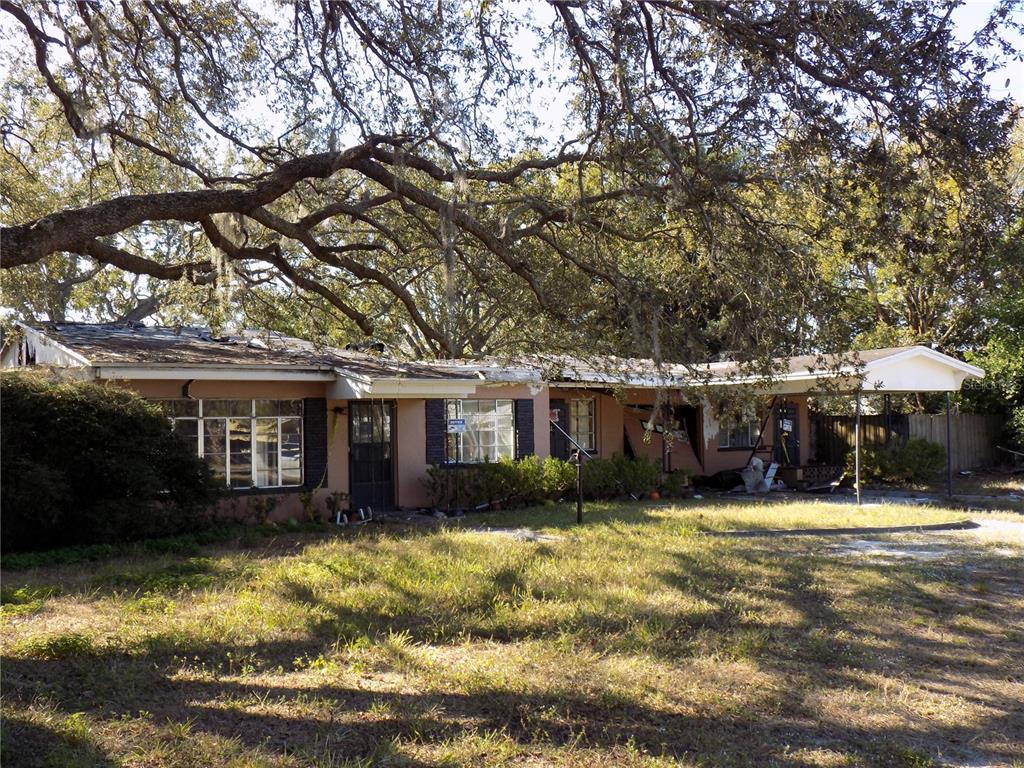 5509 Temple Heights Road Temple Terrace, FL 33617 - Photo 3 of 9 a view of a house with a yard