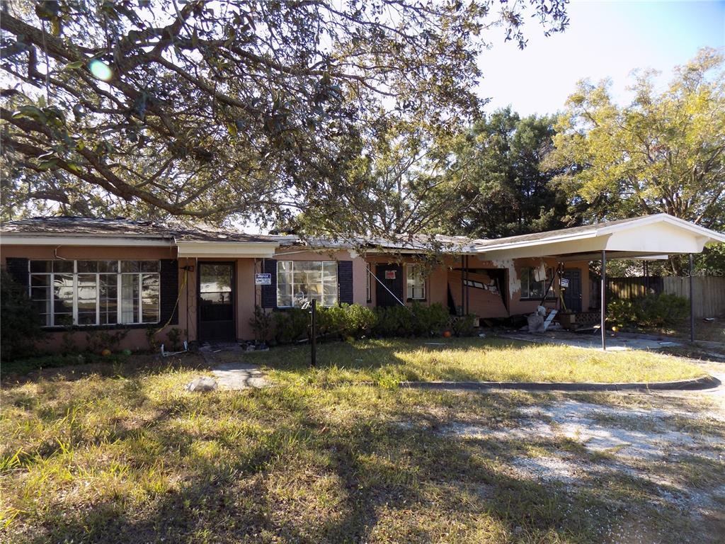 5509 Temple Heights Road Temple Terrace, FL 33617 - Photo 4 of 9 a view of house with outdoor space and swimming pool
