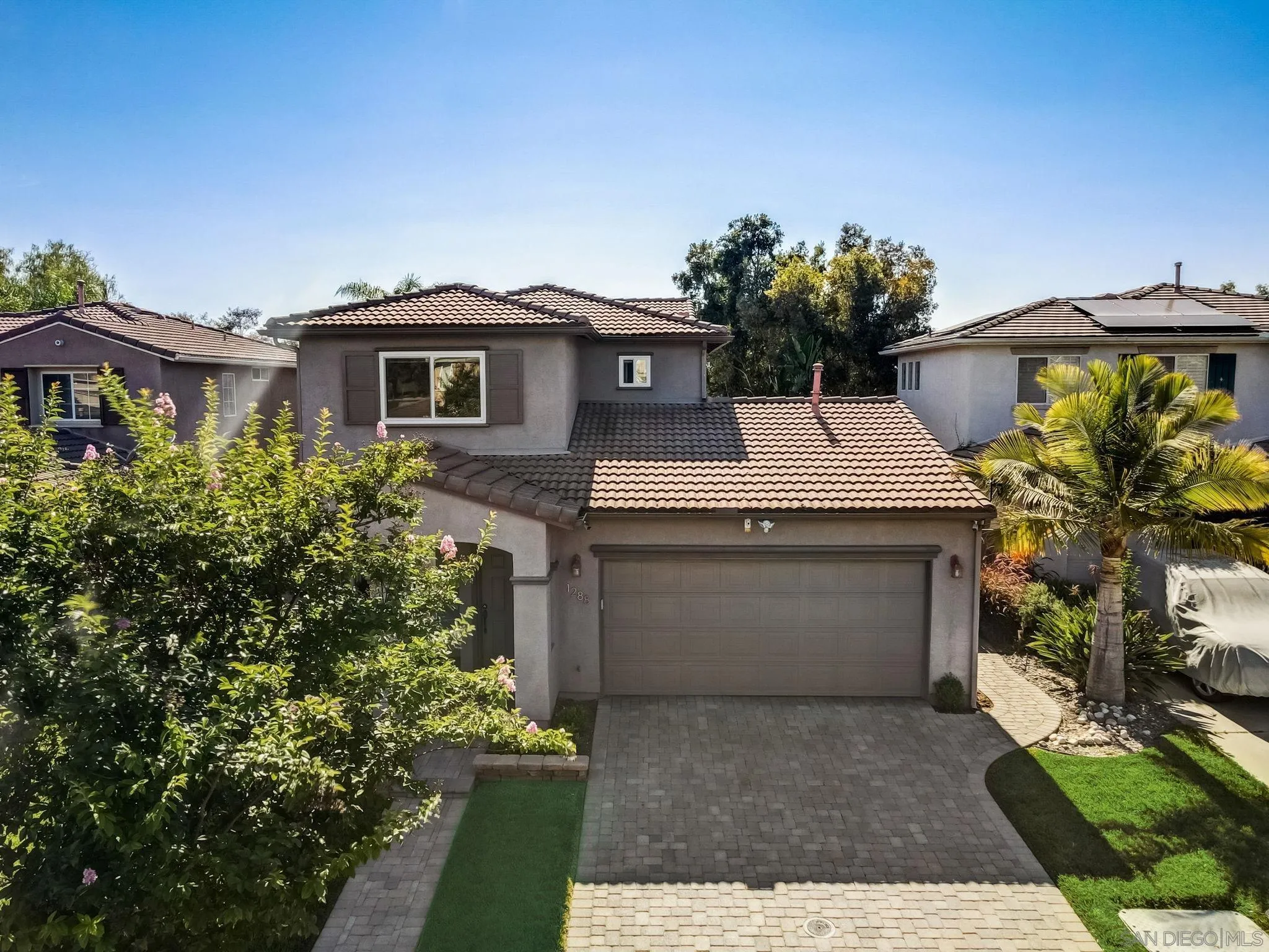 1288 Santa Lucia Road Chula Vista, CA 91913 - Photo 33 of 38 a front view of a house with a garden