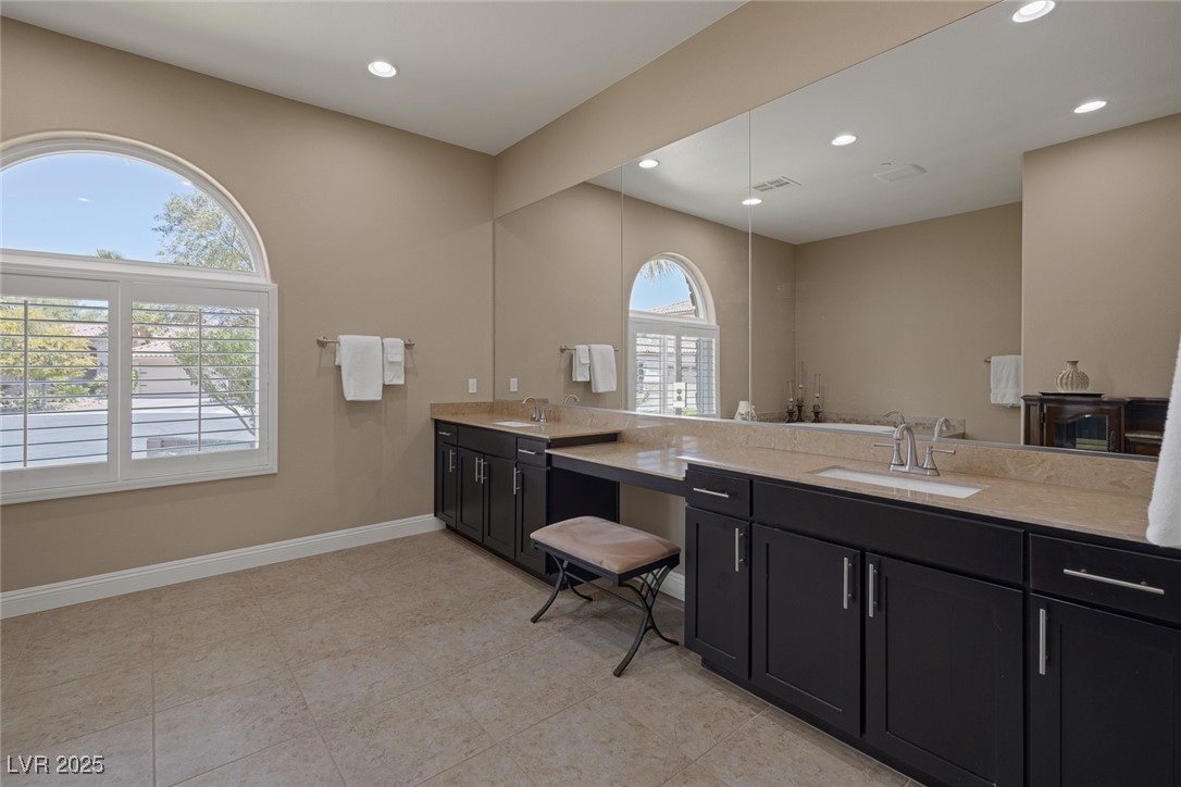 7687 West Pebble Road Las Vegas, NV 89113 - Photo 27 of 79 Bathroom with baseboards, recessed lighting, and vanity