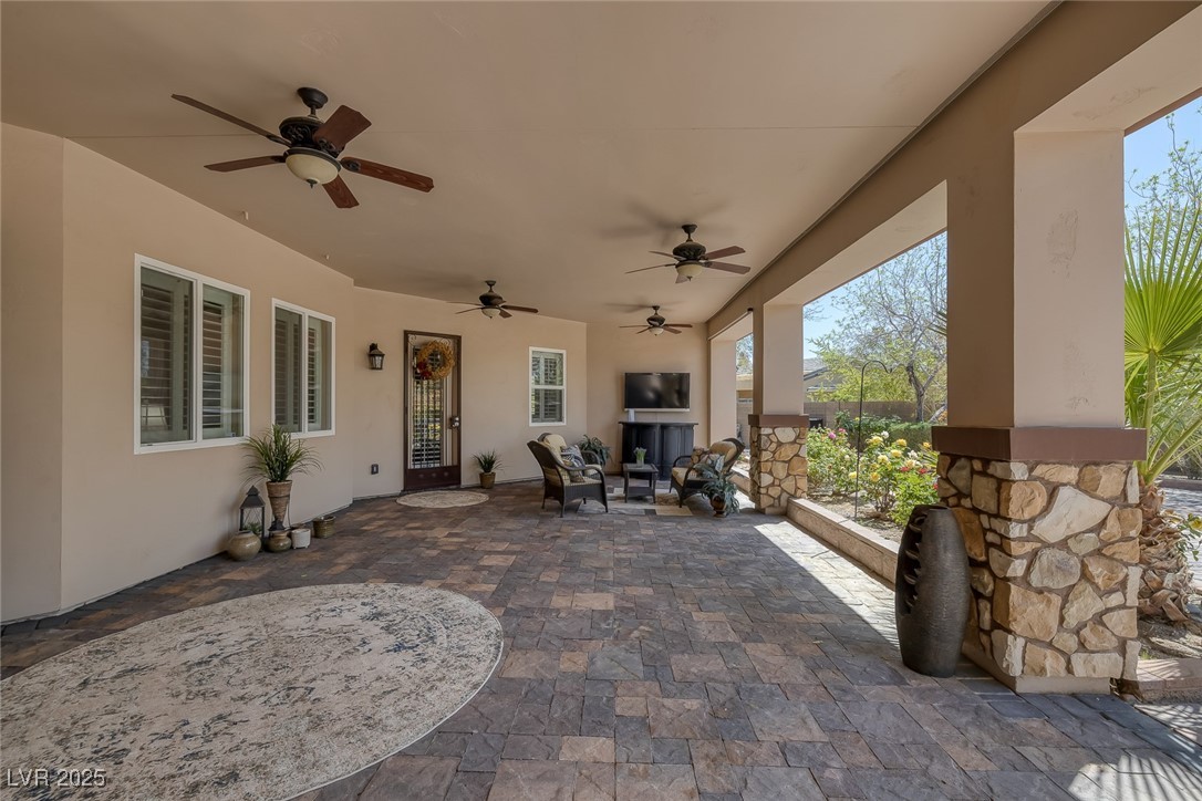 7687 West Pebble Road Las Vegas, NV 89113 - Photo 39 of 79 View of patio with a ceiling fan