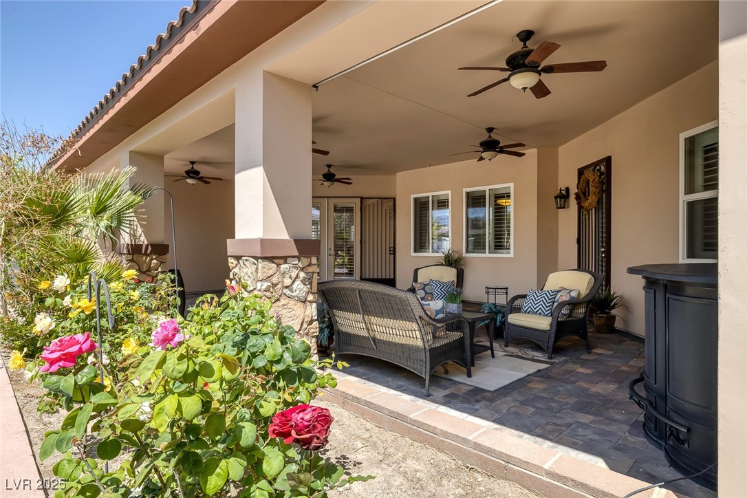 7687 West Pebble Road Las Vegas, NV 89113 - Photo 40 of 79 View of patio / terrace with outdoor lounge area and ceiling fan