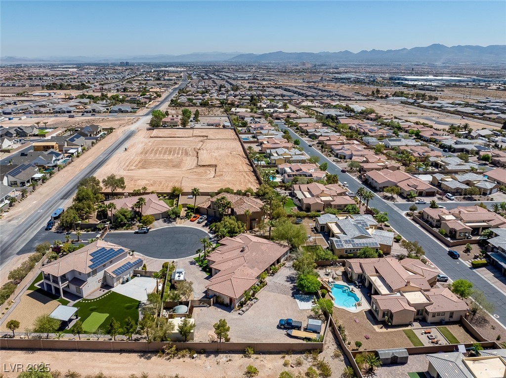 7687 West Pebble Road Las Vegas, NV 89113 - Photo 45 of 79 Bird's eye view featuring a mountain view and a residential view