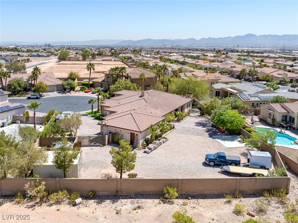 7687 West Pebble Road Las Vegas, NV 89113 - Photo 46 of 79 Bird's eye view with a mountain view and a residential view