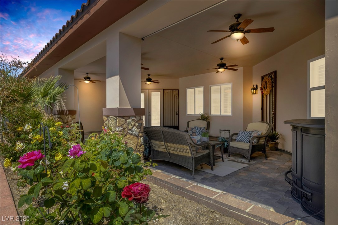 7687 West Pebble Road Las Vegas, NV 89113 - Photo 55 of 79 View of patio featuring an outdoor living space and ceiling fan