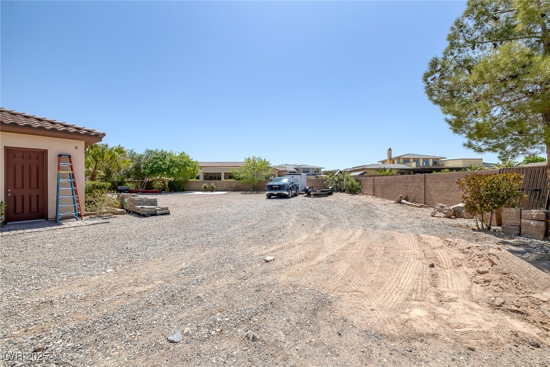 7687 West Pebble Road Las Vegas, NV 89113 - Photo 72 of 79 View of yard featuring fence