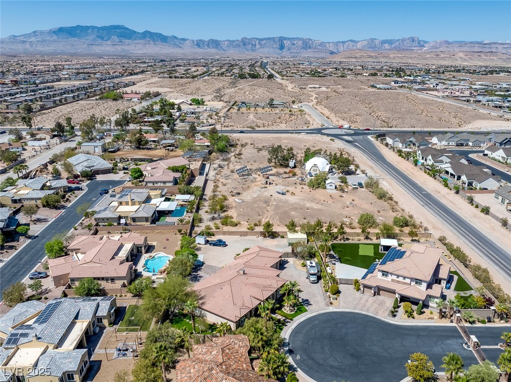 7687 West Pebble Road Las Vegas, NV 89113 - Photo 74 of 79 Bird's eye view featuring a residential view and a mountain view