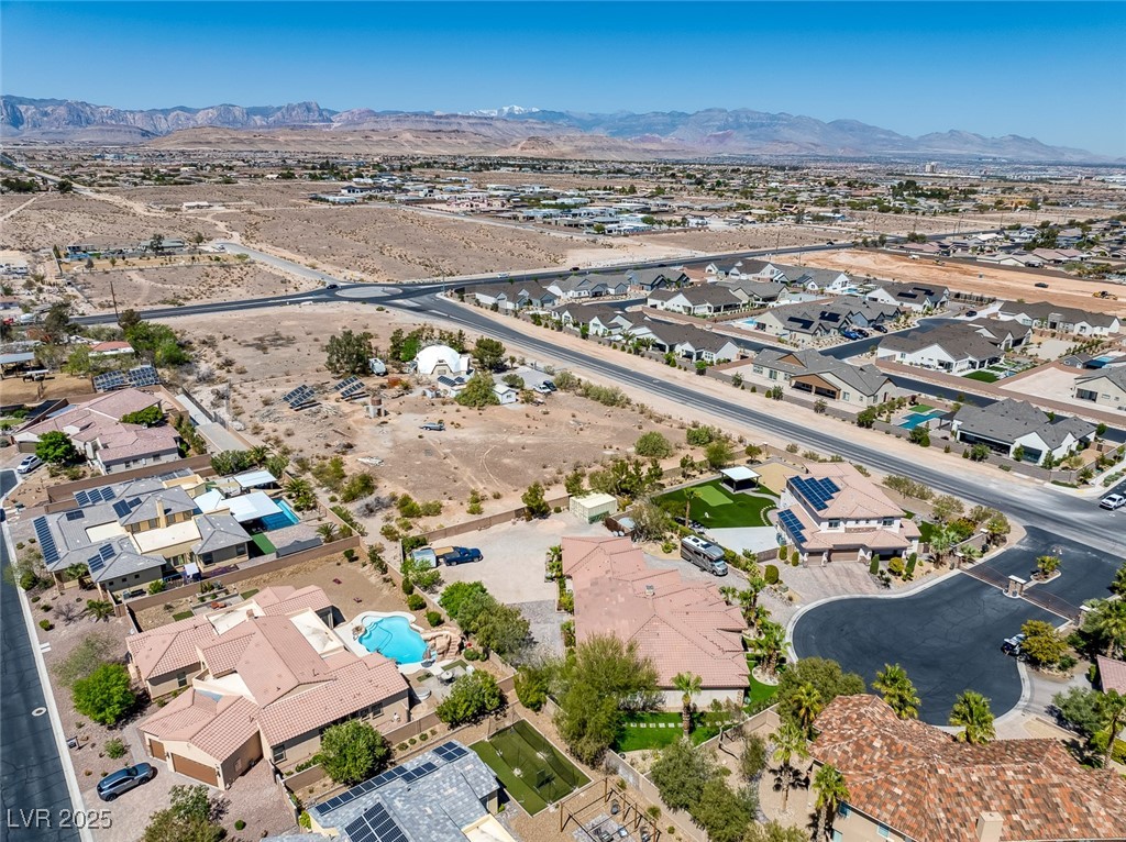 7687 West Pebble Road Las Vegas, NV 89113 - Photo 75 of 79 Birds eye view of property featuring a mountain view and a residential view