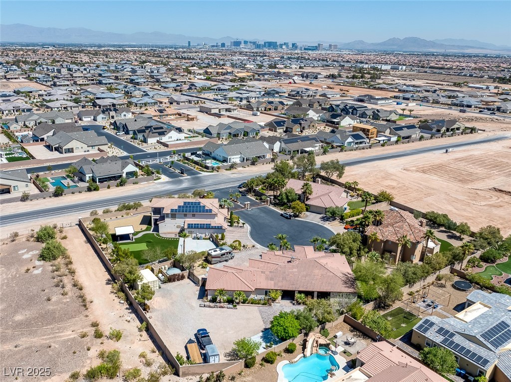 7687 West Pebble Road Las Vegas, NV 89113 - Photo 77 of 79 Bird's eye view with a residential view and a mountain view