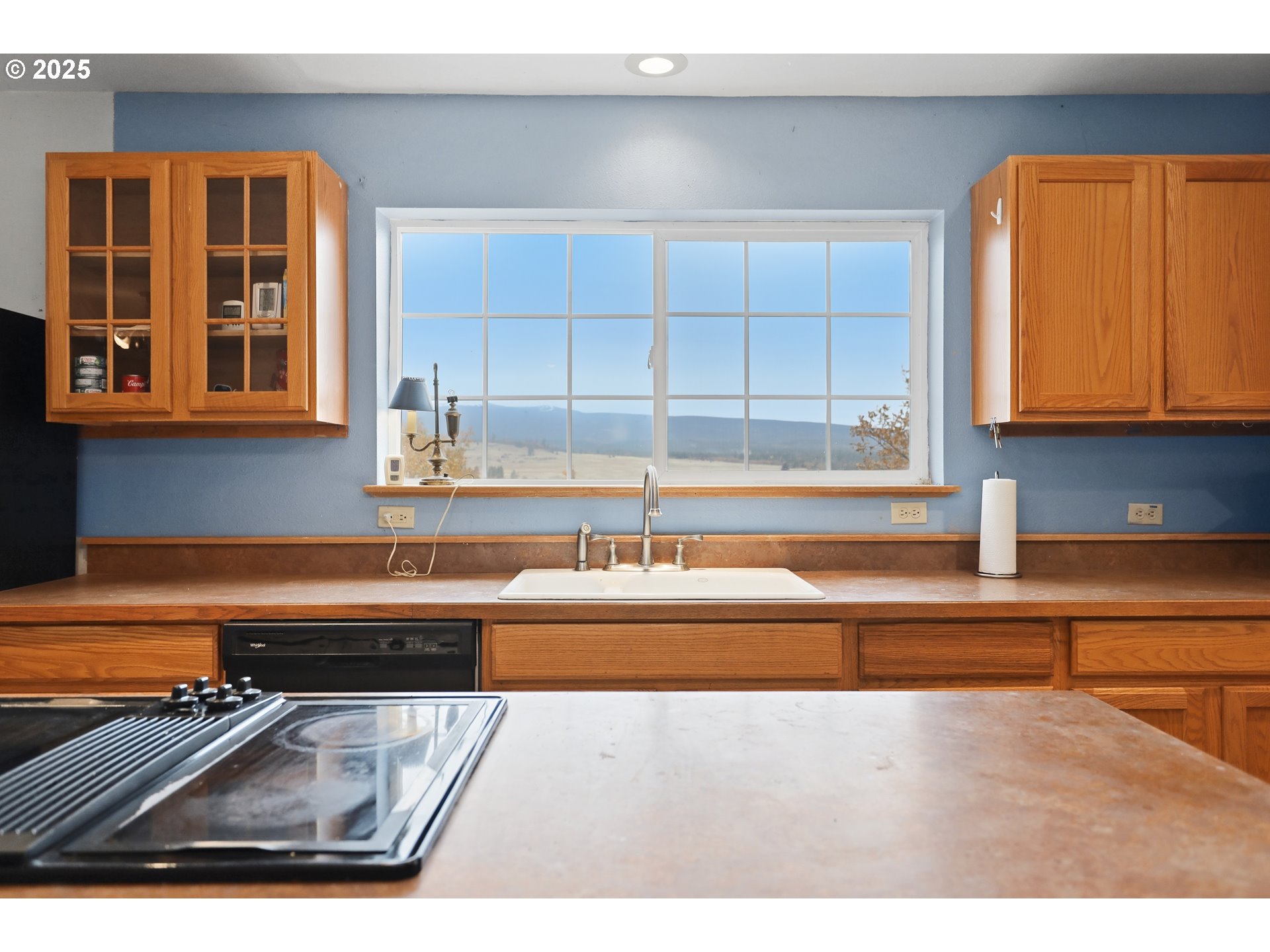 2224 Foster Place Goldendale, WA 98620 - Photo 16 of 45 a kitchen with a sink and cabinets