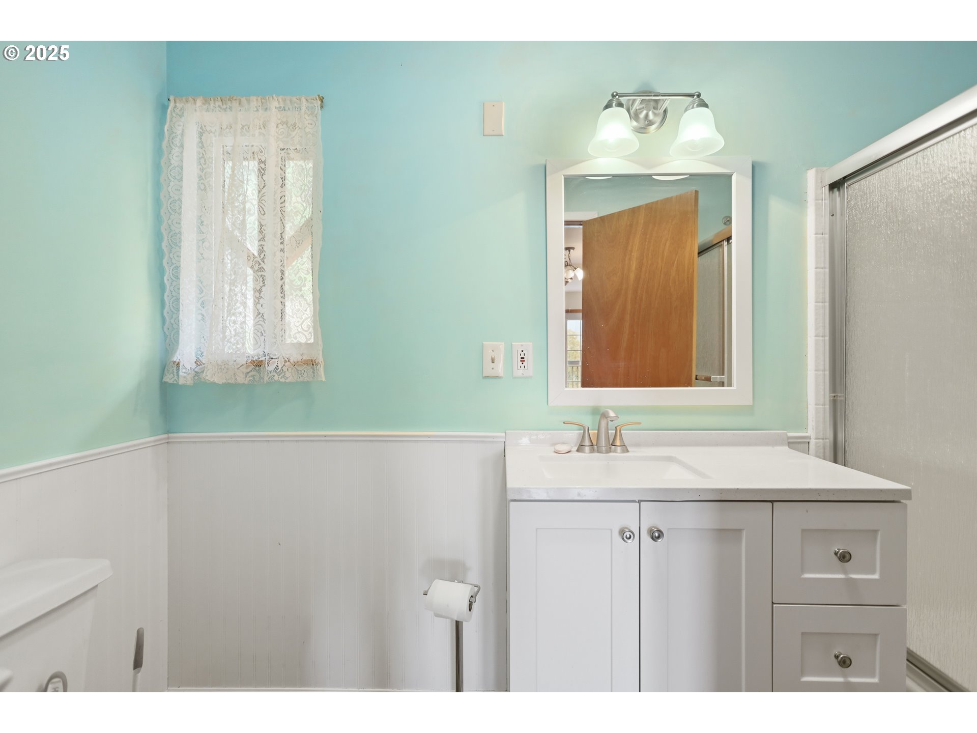 2224 Foster Place Goldendale, WA 98620 - Photo 21 of 45 a bathroom with a sink and a mirror