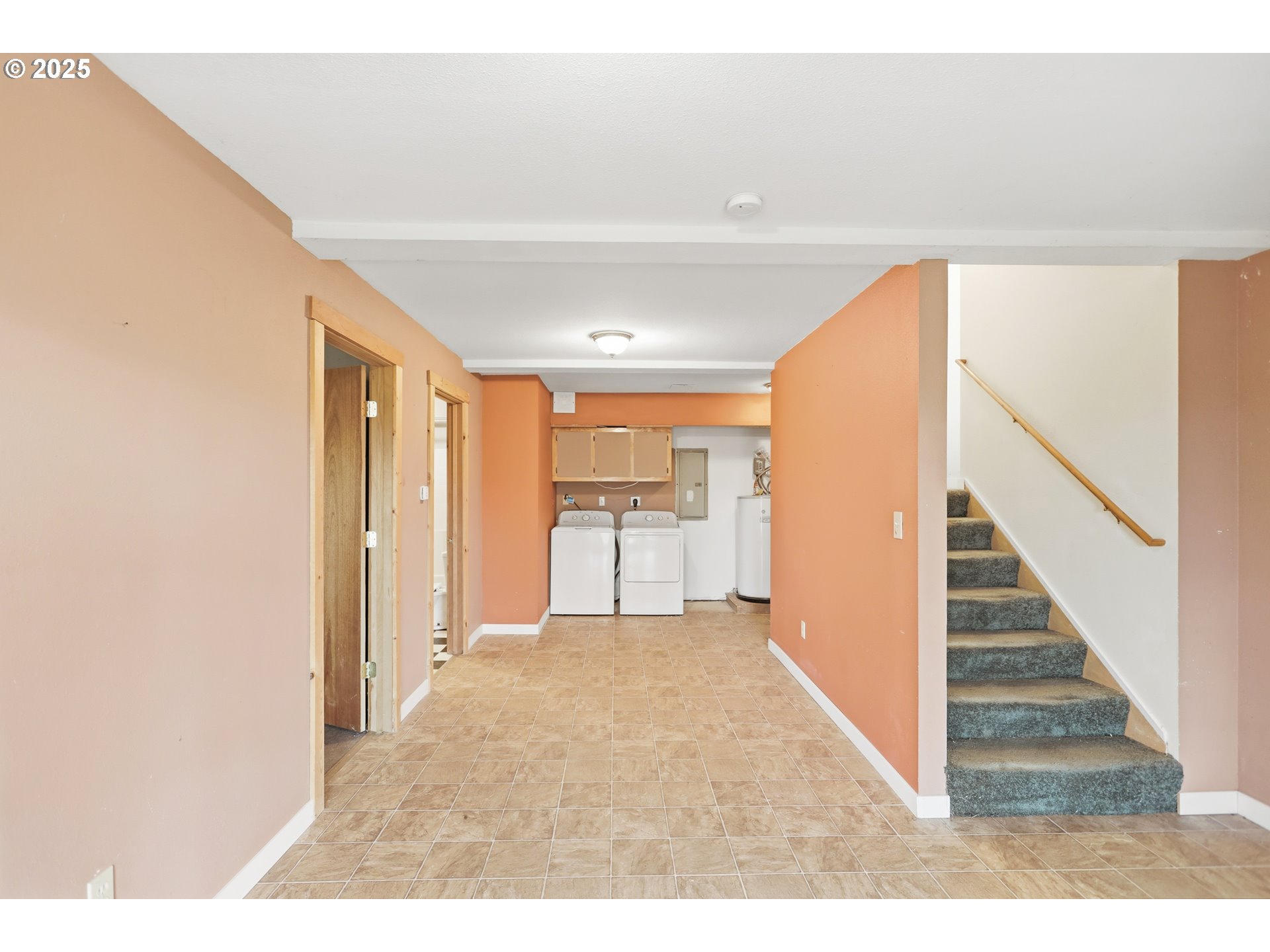 2224 Foster Place Goldendale, WA 98620 - Photo 28 of 45 a view of a kitchen with wooden floor and a living room