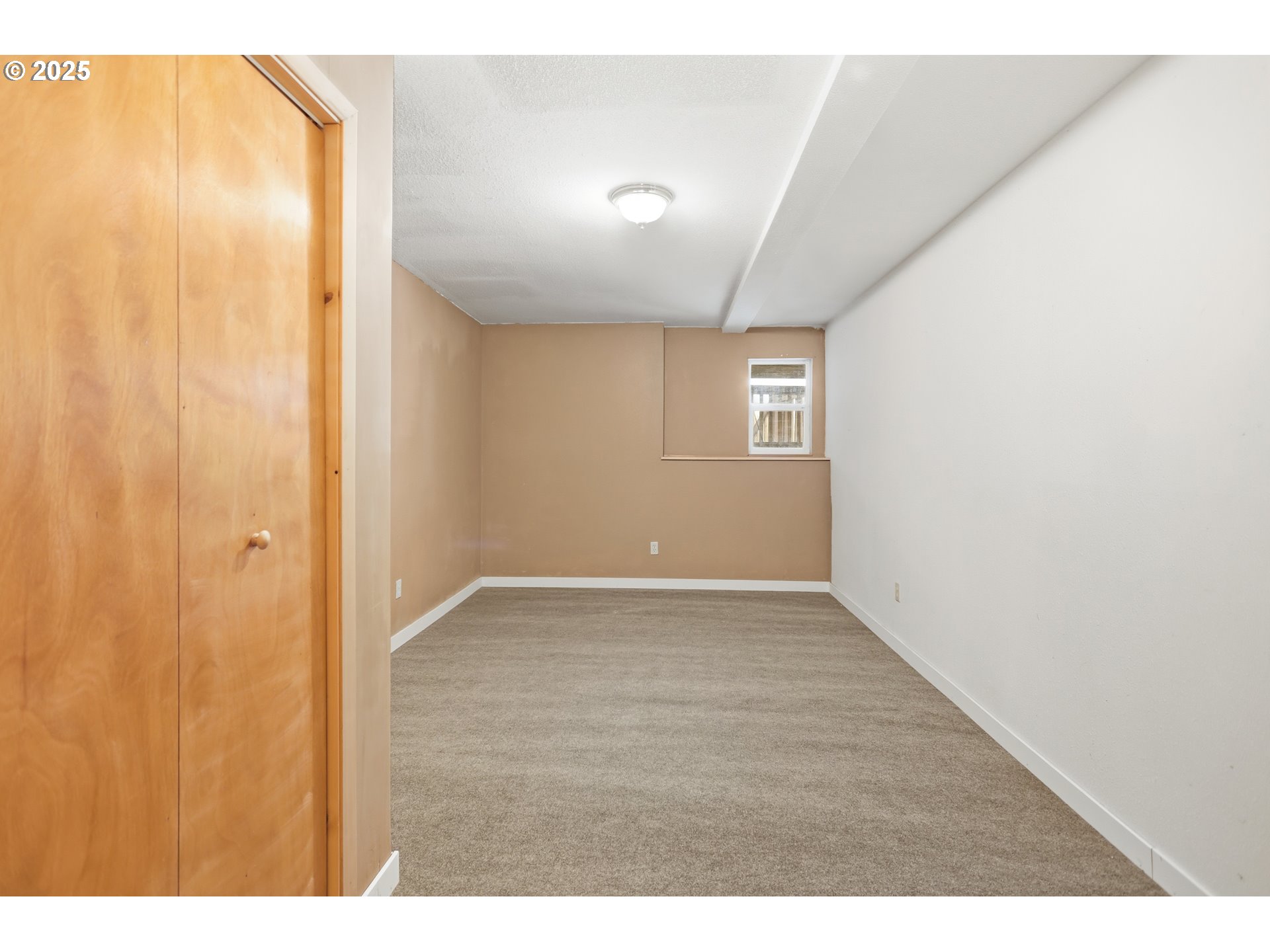 2224 Foster Place Goldendale, WA 98620 - Photo 35 of 45 a view of an empty room with wooden floor