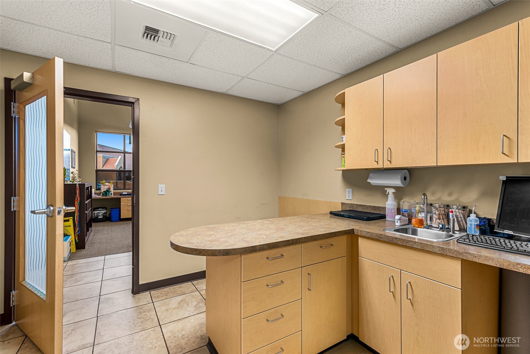 10 North Chelan Avenue Wenatchee, WA 98801 - Photo 21 of 40 a kitchen with a sink and cabinets