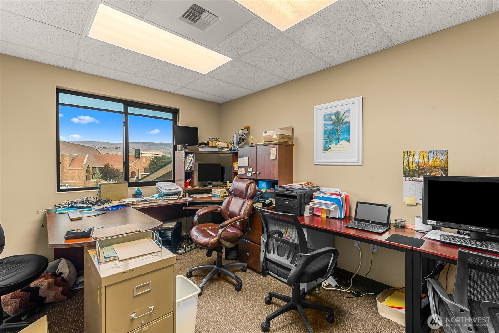 10 North Chelan Avenue Wenatchee, WA 98801 - Photo 40 of 40 a view of a workspace with furniture and a window