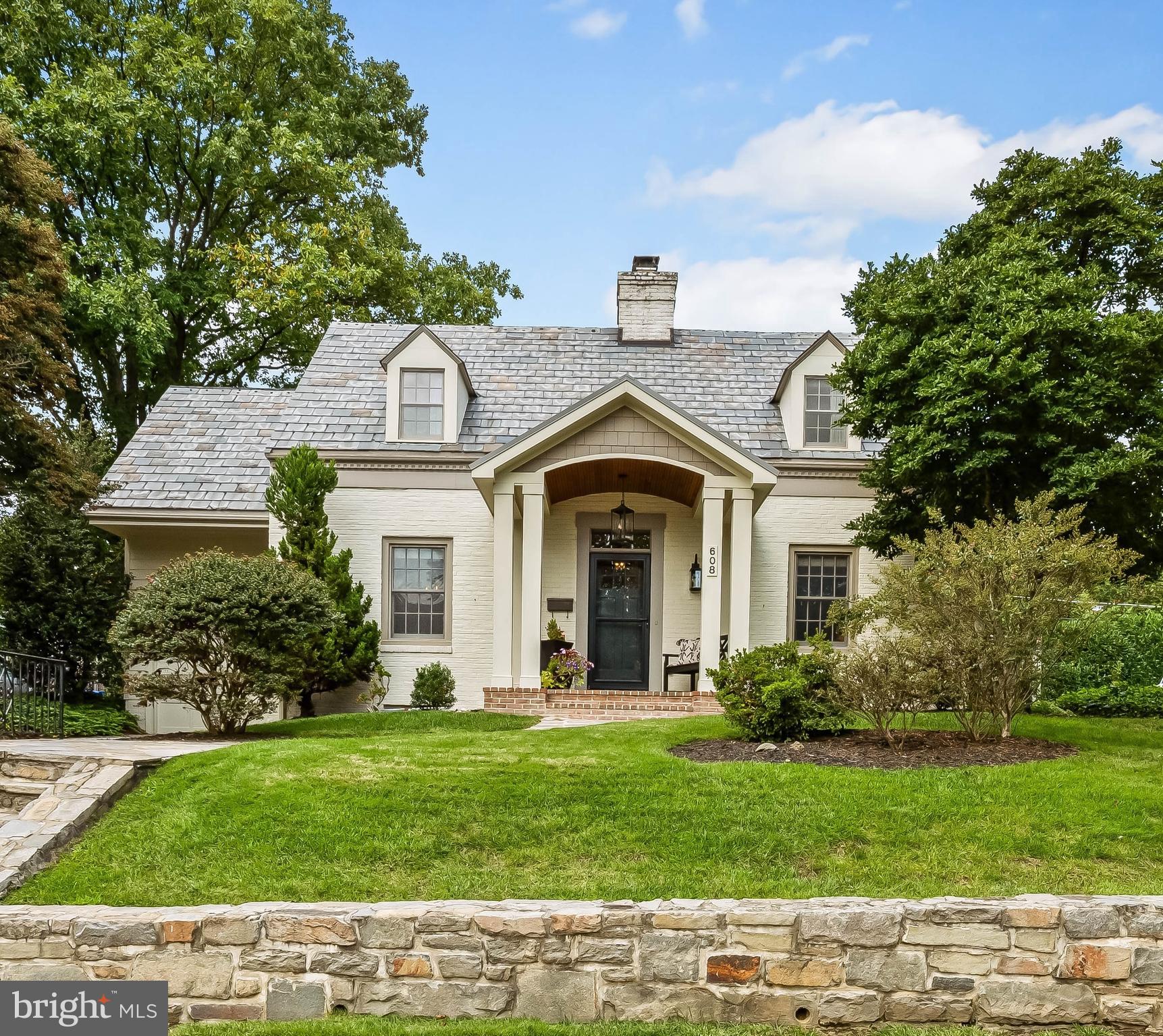 608 Worcester Road Baltimore, MD 21286 - Photo 1 of 49 a front view of a house with a yard
