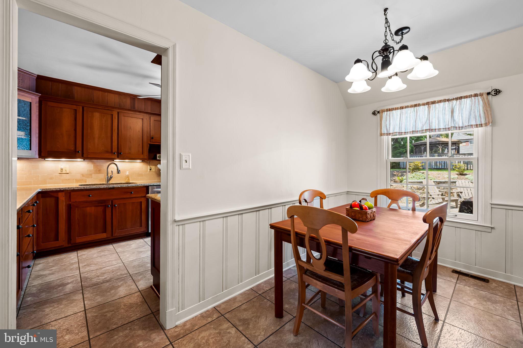 608 Worcester Road Baltimore, MD 21286 - Photo 15 of 49 a dining room with furniture and window