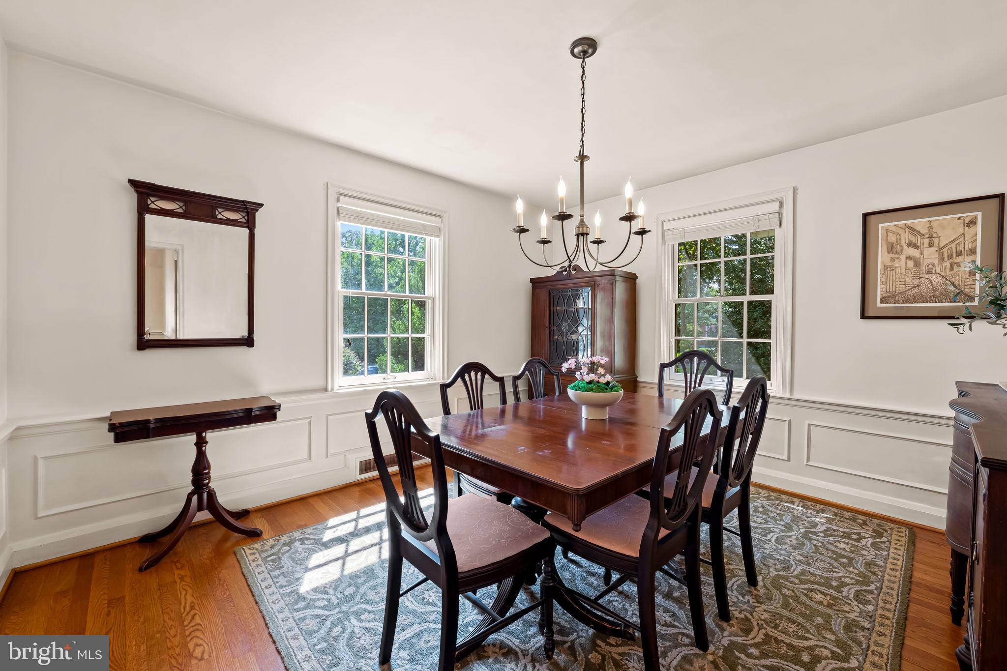 608 Worcester Road Baltimore, MD 21286 - Photo 23 of 49 a view of a dining room with furniture window and wooden floor