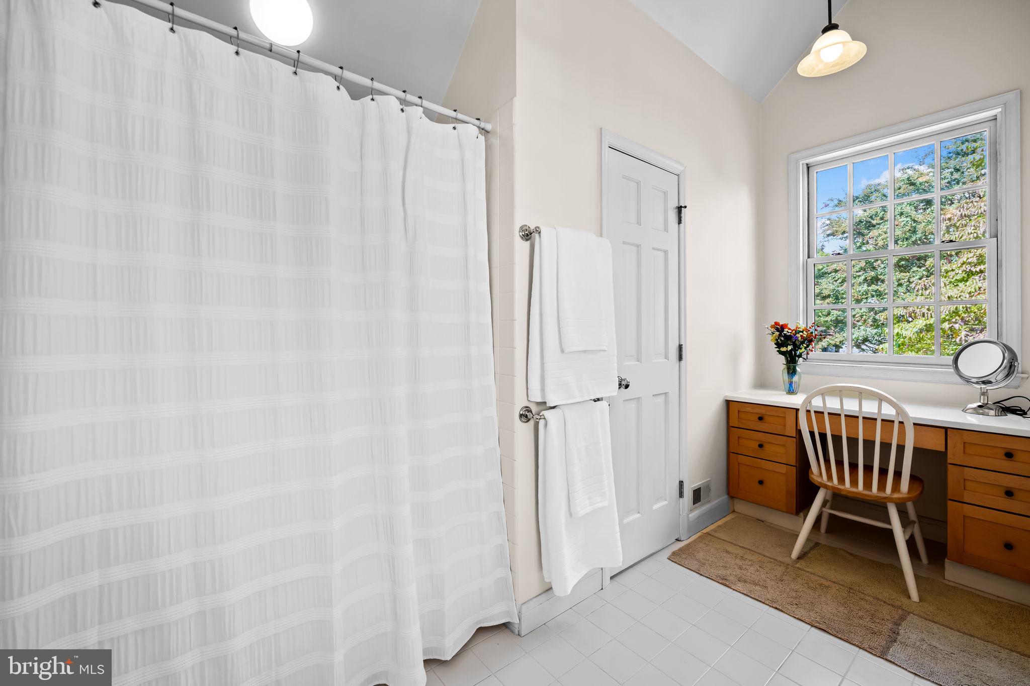 608 Worcester Road Baltimore, MD 21286 - Photo 29 of 49 a dining room with a window and furniture