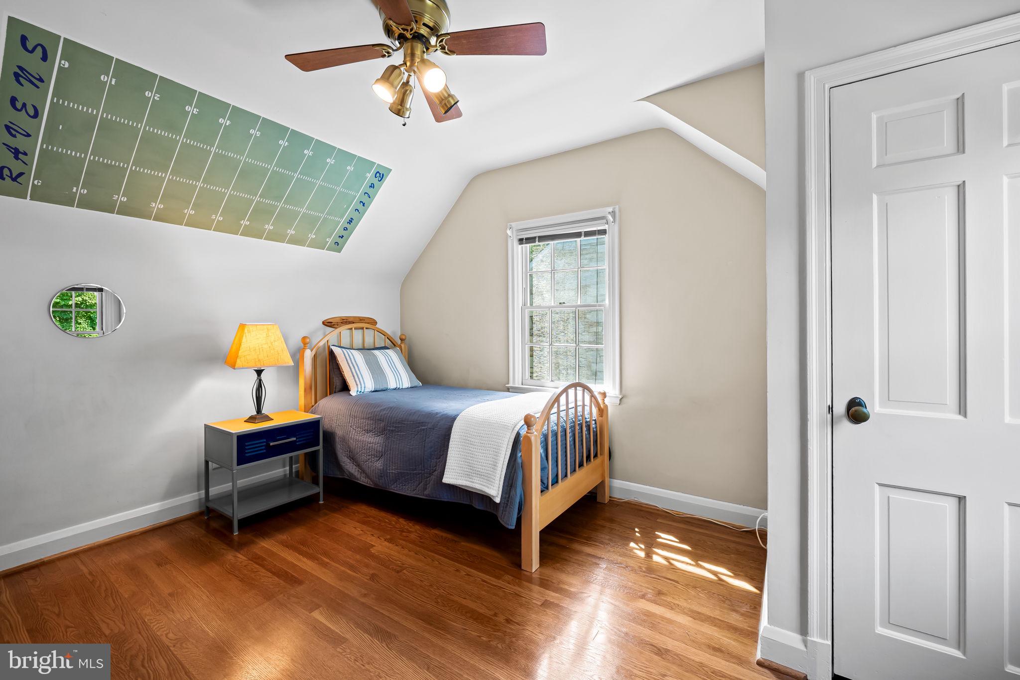 608 Worcester Road Baltimore, MD 21286 - Photo 34 of 49 a bedroom with a bed and a window