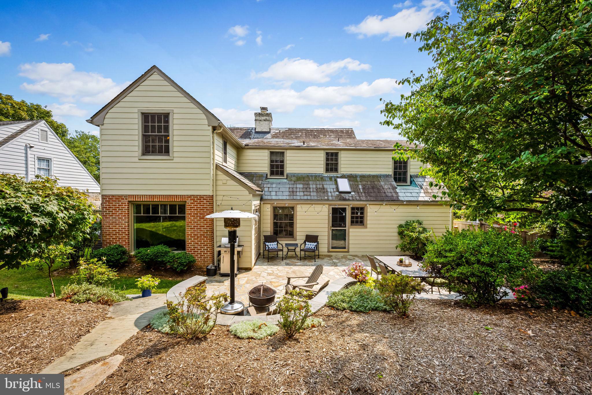 608 Worcester Road Baltimore, MD 21286 - Photo 45 of 49 a front view of a house with garden